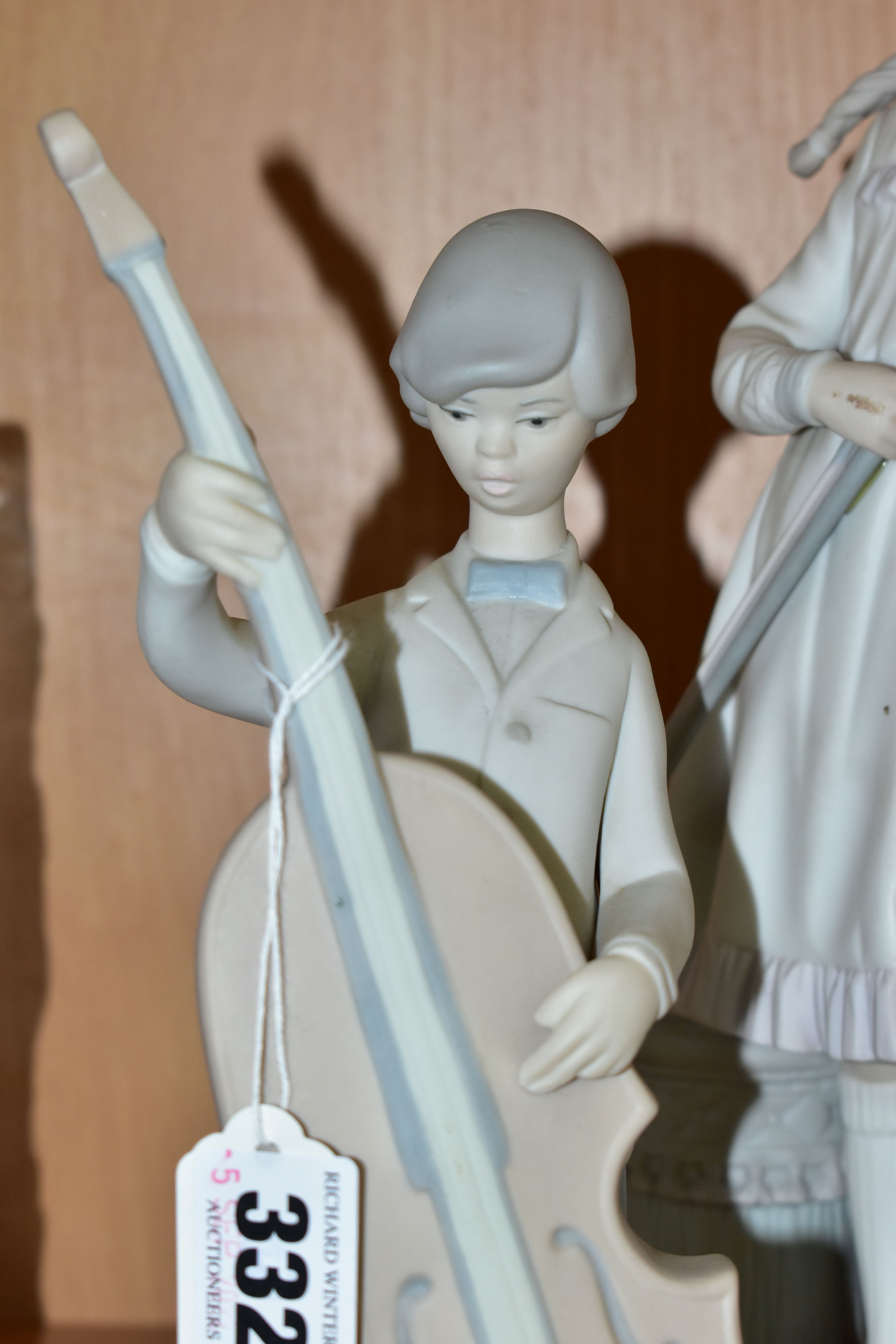 TWO LLADRO FIGURINES WITH A MUSICAL THEME, in matt finish, comprising Boy With Double Bass 4615, - Image 2 of 5