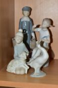 THREE LLADRO FIGURINES AND A LLADRO DUCK FIGURE, comprising Boy with Pails 4811, issued in 1972,