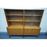 TWO MID CENTURY TEAK TURNIDGE OF LONDON BOOKCASES, comprising a double glazed bookcase above