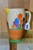 A CLARICE CLIFF CROCUS PATTERN CORONET WATER JUG, painted with purple, blue and orange crocuses,