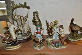 SEVEN CAPODIMONTE FIGURES, to include a couple on a swing signed G Armani height 42cm. a figural