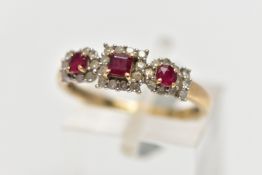 A 9CT GOLD RUBY AND DIAMOND RING, designed as three clusters, the centrally cluster set with a