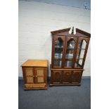 A MODERN MAHOGANY BOOKCASE, the top with two glazed doors, enclosing two glass shelves, base with