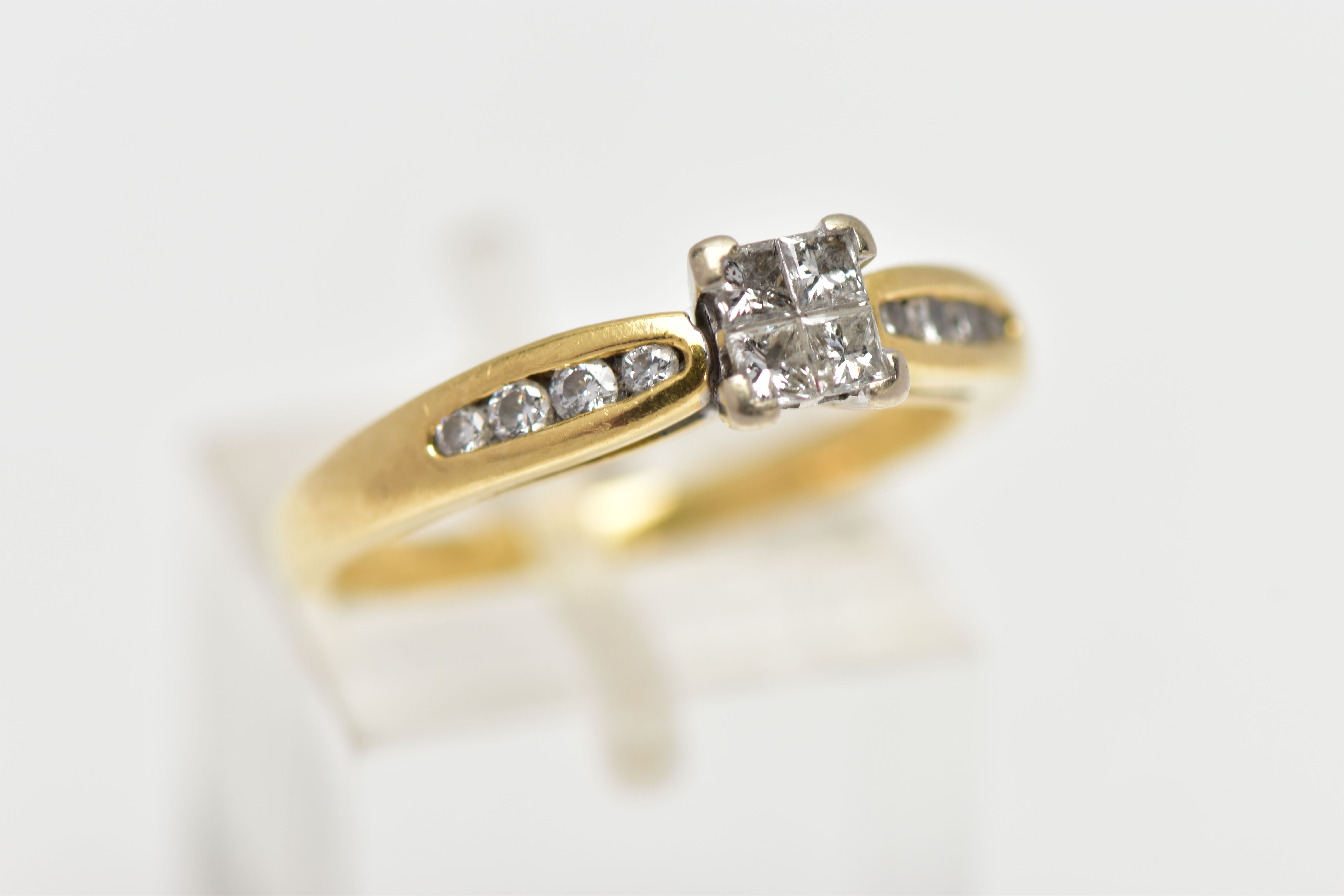 AN 18CT YELLOW GOLD DIAMOND RING, set with a square shape panel of four princess cut diamonds, to - Image 4 of 4