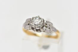 A MID 20TH CENTURY DIAMOND SINGLE STONE RING, set with a round brilliant cut diamond, within an