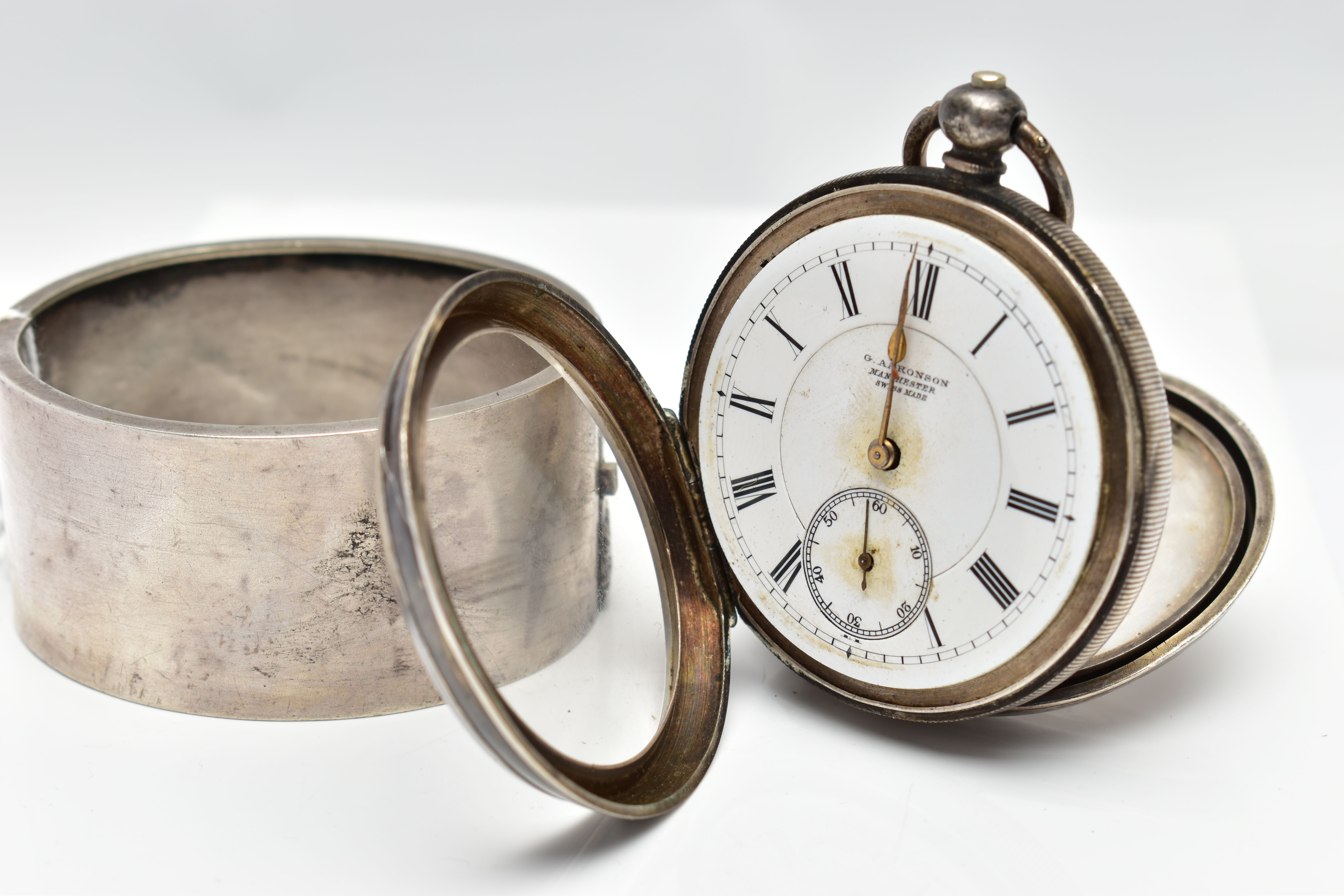 A SILVER POCKET WATCH AND WHITE METAL BANGLE, the first a silver open face pocket watch, the white - Image 3 of 4