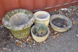 FOUR MODERN COMPOSITE CIRCULAR GARDEN PLANTERS the largest having a lattice detail to sides diameter