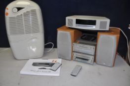 A BOSE WAVE MUSIC SYSTEM III with remote and instructions, along with a Sony TC-SD1 hi-fi system