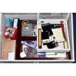 A LARGE JEWELLERY DISPLAY CASE AND OTHER ITEMS, a large wooden case with glass panel, encasing two