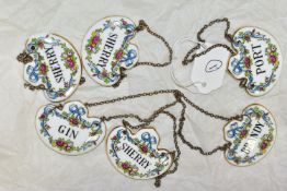 A BOX OF SIX CROWN STAFFORDSHIRE DECANTER LABELS, comprising 'Port', 'Brandy', 'Gin' and three '