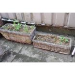 TWO COMPOSITE RECTAGONAL GARDEN PLANTERS , the tallest being width 65cm depth 28cm, height 27cm, (