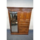 A LATE 19TH EARLY 20TH CENTURY MAPLE AND CO WALNUT COMPACTIUM WARDROBE, loose overhanging cornice, a