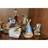 SEVEN BESWICK BEATRIX POTTER FIGURES AND A BESWICK DISPLAY STAND No 2295, comprising Benjamin