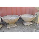 A PAIR OF COMPOSITE OYSTER SHELL GARDEN PLANTERS with shaped square bases, top is circular width and