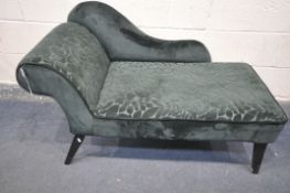 A MODERN DARK GREEN AND FLORAL CHAISE LOUNGE, on black square tapering legs, length 120cm x depth