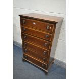 A TALL MAHOGANY AND CROSSBANDED CHEST OF SIX LONG GRADUATED DRAWERS, on bracket feet, width 61cm x