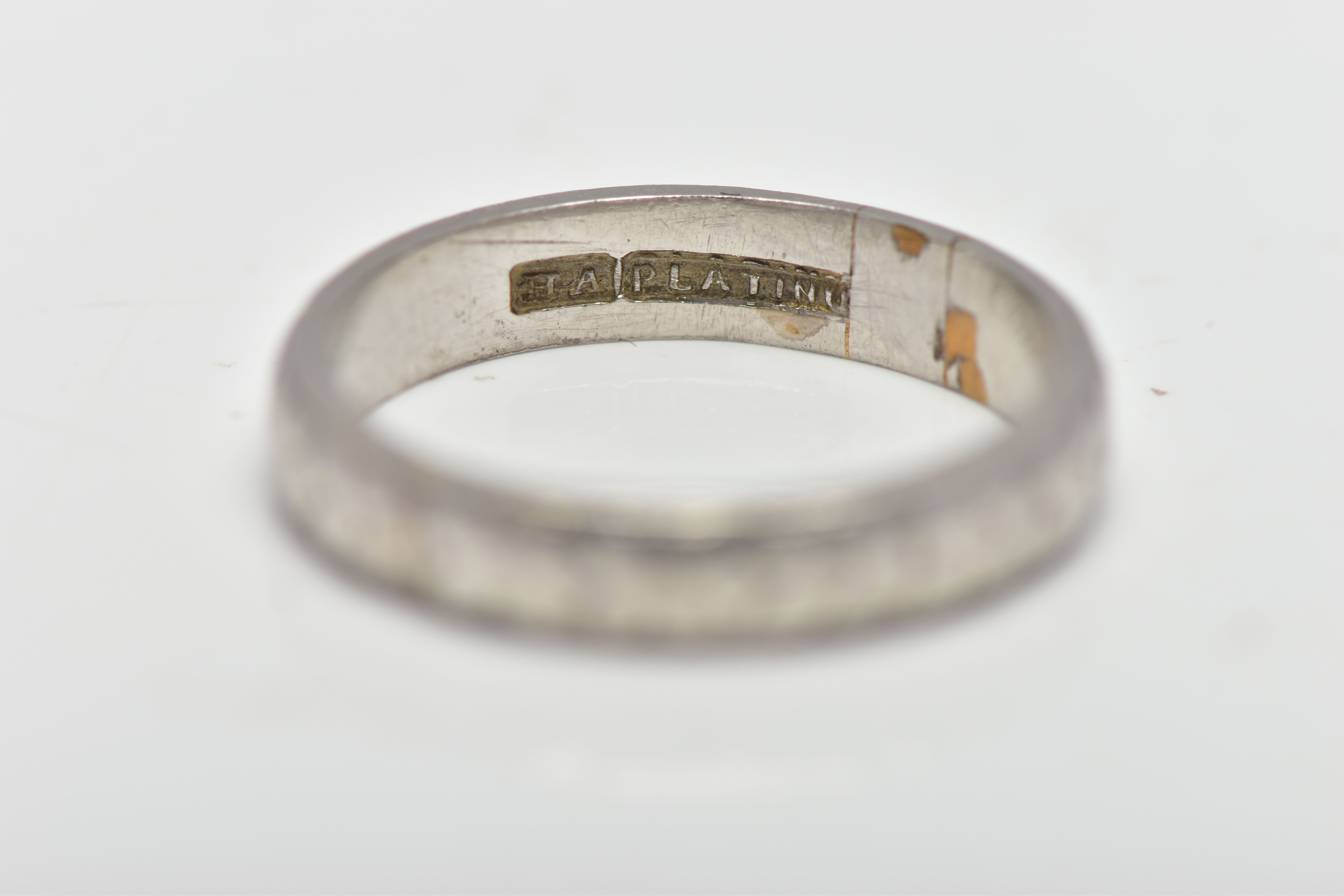 A WHITE METAL BAND RING, decorated with a slightly worn floral pattern, stamped 'HA Platinum', - Image 4 of 4