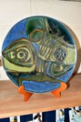 A POOLE POTTERY DELPHIS CIRCULAR CHARGER, abstract pattern in blue and green, diameter 36cm, printed