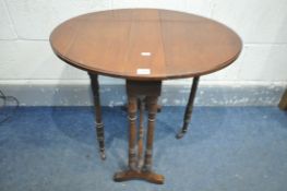 AN EDWARDIAN MAHOGANY OVAL SUTHERLAND TABLE, on turned legs, and turned stretchers, open width