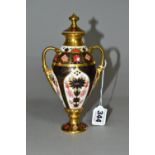 A ROYAL CROWN DERBY OLD IMARI 1128 SOLID GOLD BAND TWIN HANDLED VASE AND COVER, of slender form with