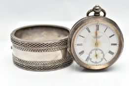 A SILVER POCKET WATCH AND WHITE METAL BANGLE, the first a silver open face pocket watch, the white