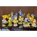 TWENTY ONE ROYAL DOULTON WINNIE THE POOH FIGURES, comprising Winnie the Pooh and the Honeypot WP1,