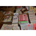 THIRTEEN BOXES OF CRAFT PAPERS, STICKERS AND STENCILS, to include craft papers in 12x12'', 8x8'',