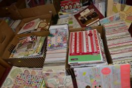 THIRTEEN BOXES OF CRAFT PAPERS, STICKERS AND STENCILS, to include craft papers in 12x12'', 8x8'',