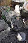 A PAIR OF COMPOSITE GARDEN PLANTERS , a similar planter and a plaque, the pair have foliate detail