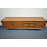 A MID CENTURY TEAK SIDEBOARD, with two cupboard doors, five graduated drawers, top drawer with