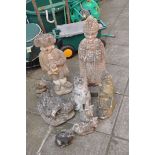 A SELECTION OF EIGHT COMPOSITE GARDEN FIGURES including a Bishop height 65cm, a town crier height