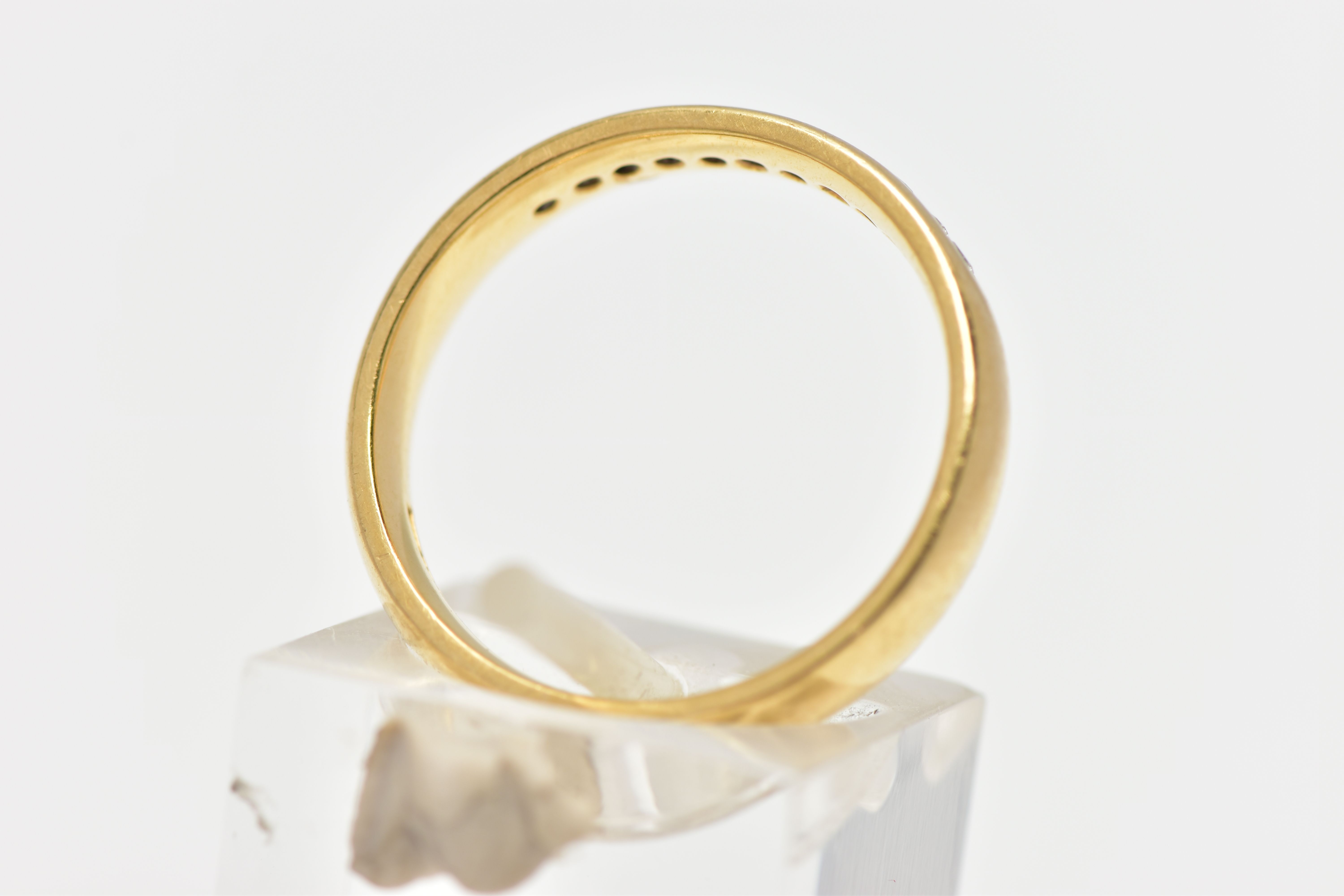 AN 18CT YELLOW GOLD DIAMOND BAND RING, set with a line of eleven round brilliant cut diamonds, - Image 3 of 4