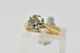 AN 18CT GOLD DIAMOND SINGLE STONE RING, the brilliant cut diamond within a claw setting, to the