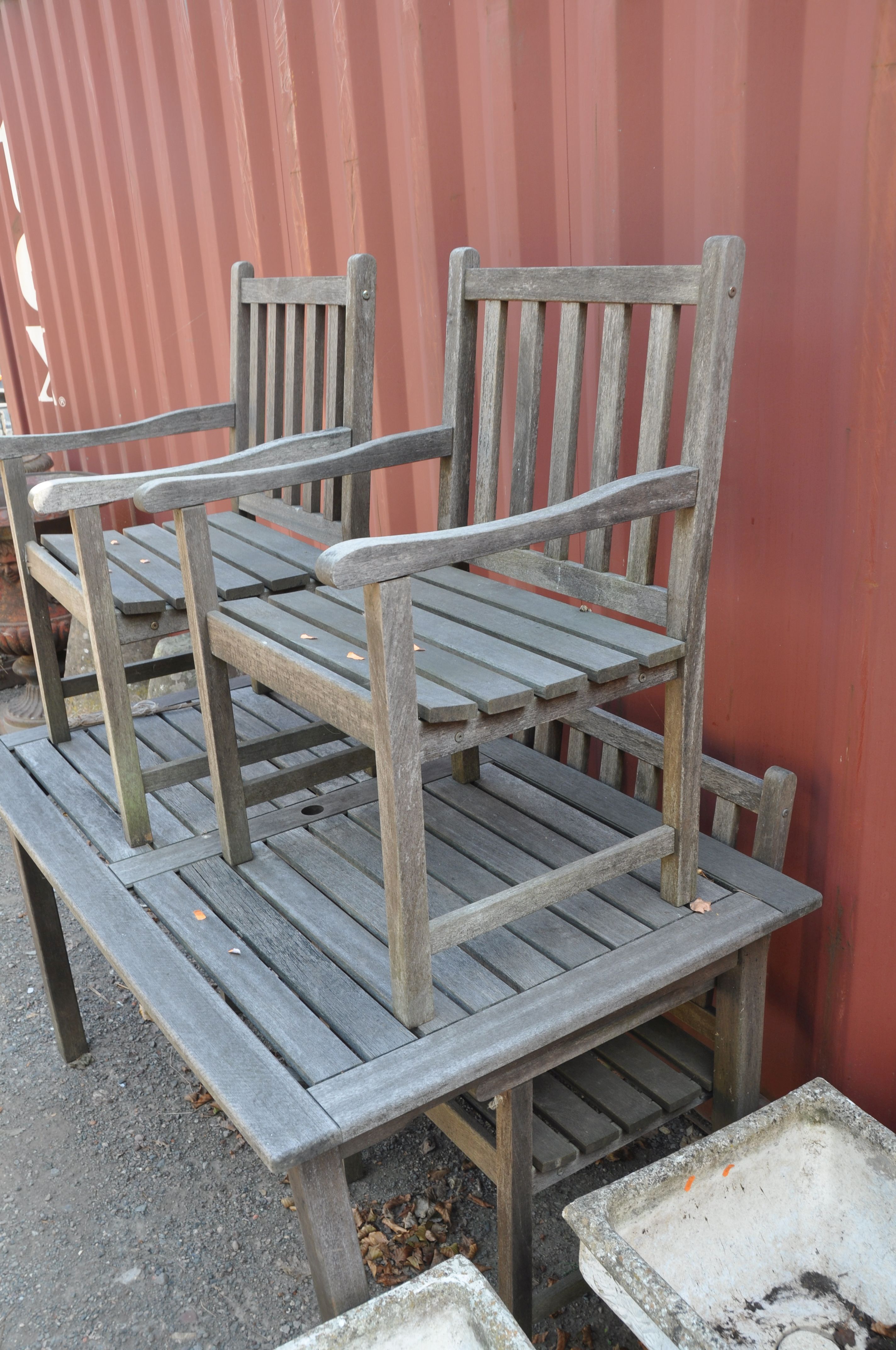 A MODERN HARDWOOD GARDEN TABLE AND FOUR CARVER CHAIRS table width 150cm, depth 90cm height 76cm ( - Image 3 of 3