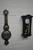 AN EARLY 20TH CENTURY EBONISED WALL CLOCK, the enamel dial with roman numerals, height 67cm (winding