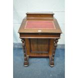 A 20TH CENTURY MAHOGANY DAVENPORT, with a raised back, red leather and gilt writing surface, on