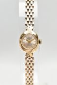 A LADIES 9CT GOLD 'ROTARY' WRISTWATCH, hand wound movement, round silver dial signed 'Rotary, 21