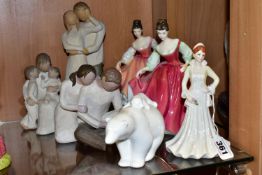 A GROUP OF FIGURINES AND A POLAR BEAR FIGURE, comprising a Coalport Heart to Heart series '