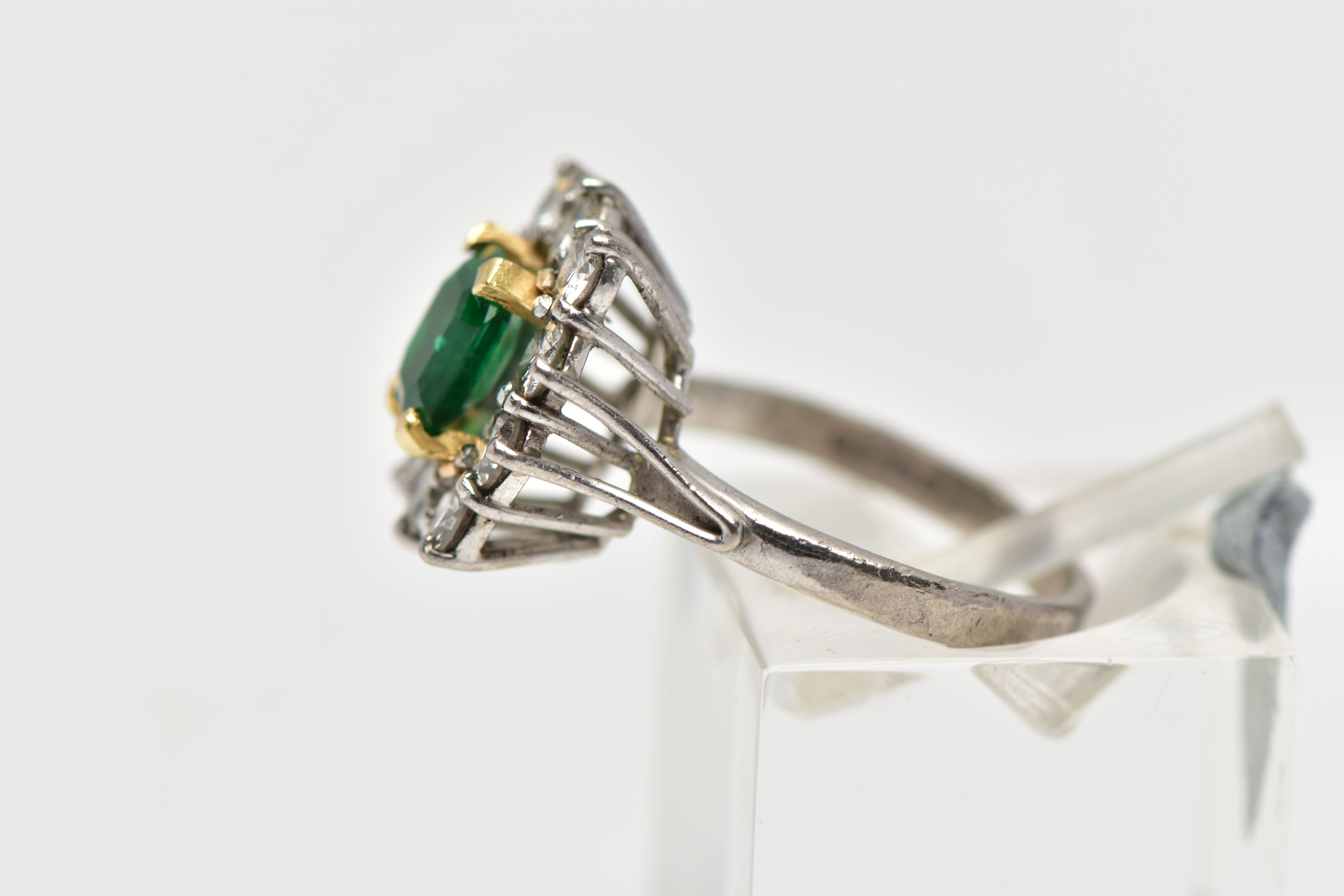 AN 18CT WHITE AND YELLOW GOLD EMERALD AND DIAMOND CLUSTER RING, the rectangular cut emerald, - Image 2 of 4