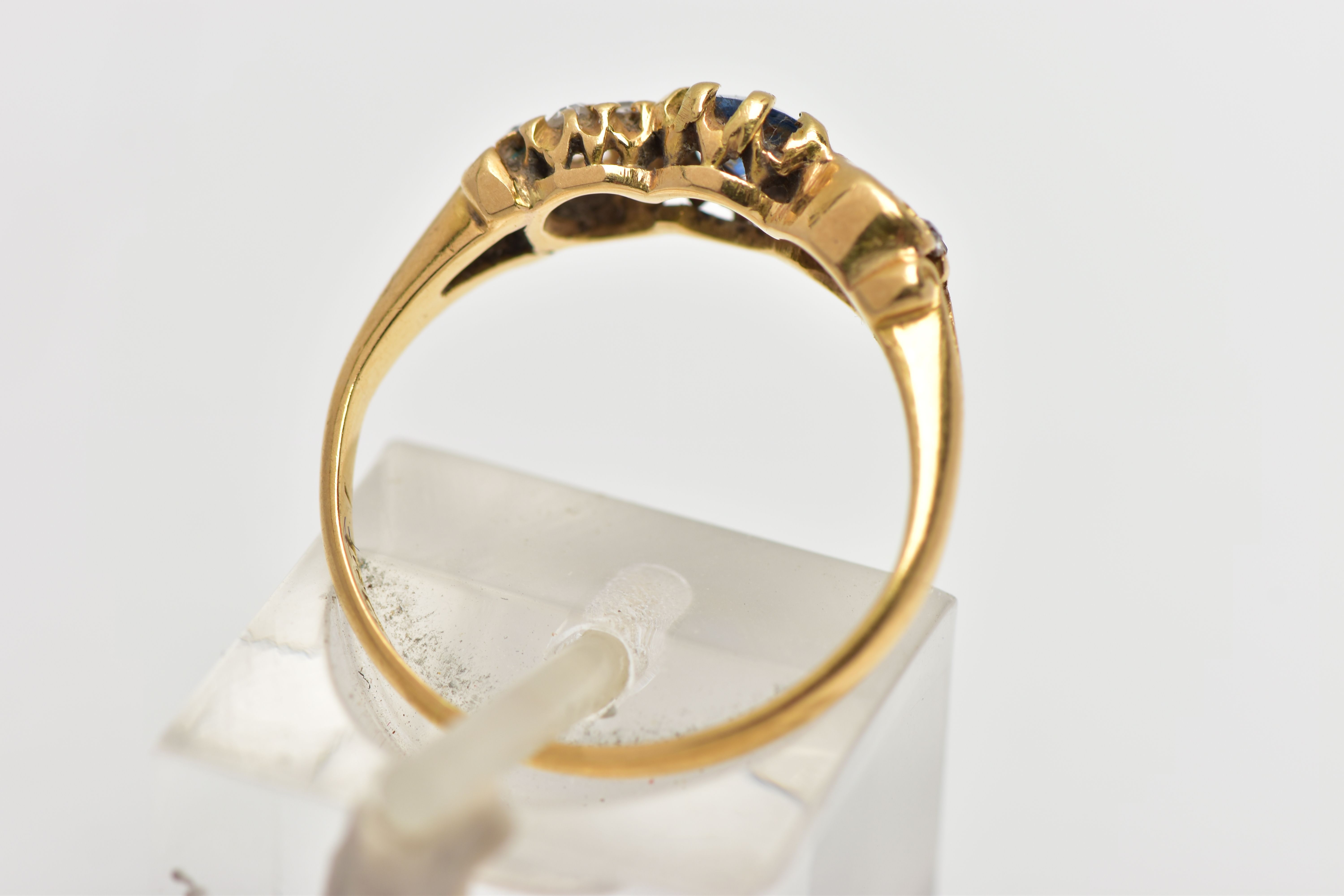 A LATE VICTORIAN 18CT GOLD SAPPHIRE AND DIAMOND DRESS RING, the oval cut sapphire claw set, with old - Image 3 of 4