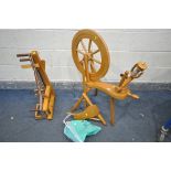 A 20TH CENTURY BEECH SPINNING WHEEL, a bag of parts, and a loom