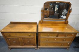 A EARLY TO MID 20TH CENTURY OAK DRESSING CHEST, with a single mirror, two short over two long