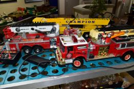 THREE BATTERY OPERATED MODEL VEHICLES, comprising New Bright and Scientific Toys Ltd fire engines,