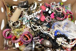 A LARGE BOX OF ASSORTED COSTUME JEWELLERY, to include a selection of beaded jewellery, a number of