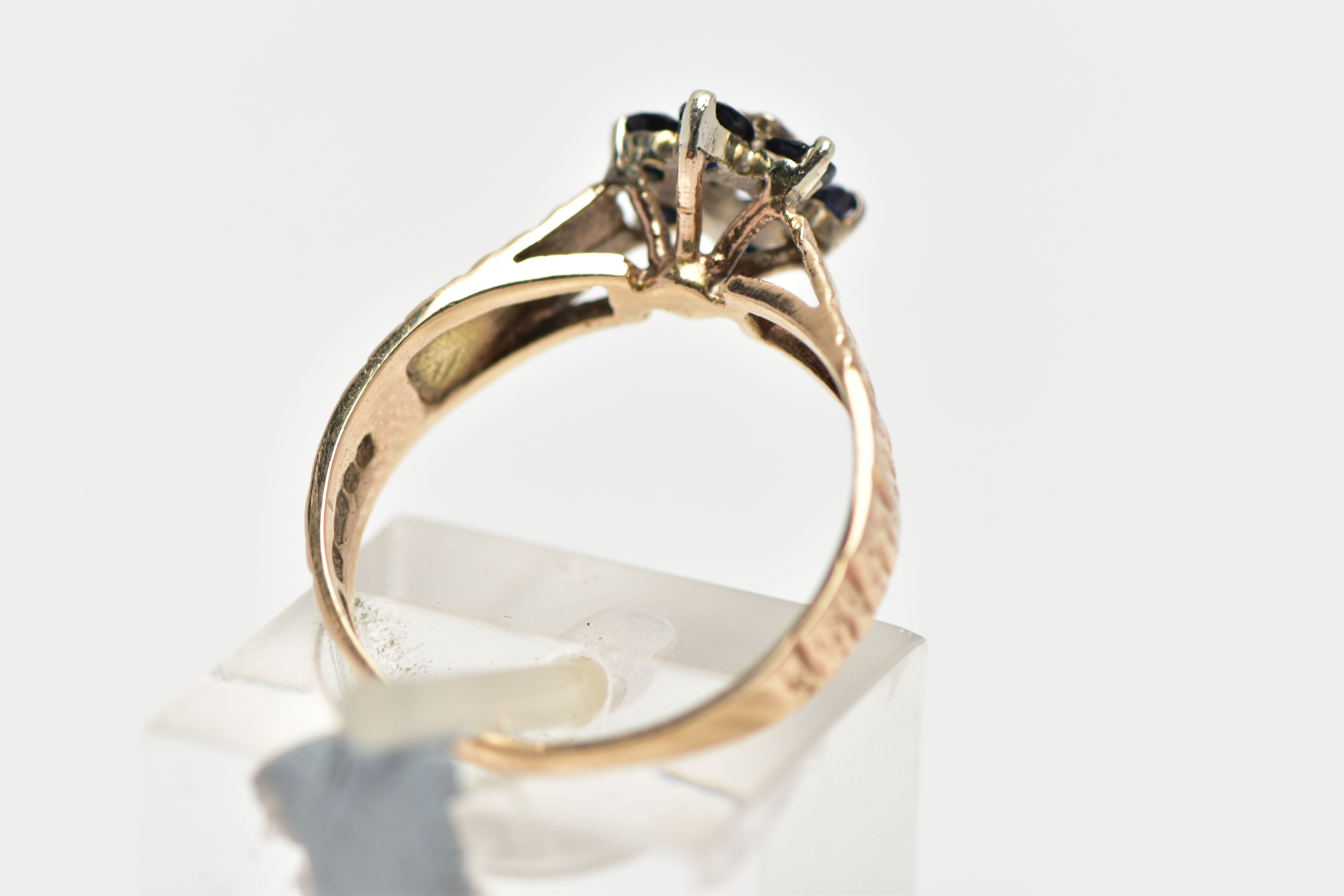 A 9CT GOLD SAPPHIRE AND DIAMOND CLUSTER RING, centring on an illusion set, single cut diamond, - Image 3 of 4