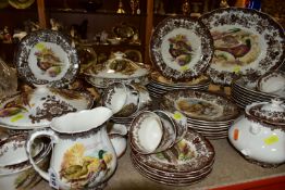 A ROYAL WORCESTER PALISSY 'GAME SERIES' PATTERN DINNER SET comprising one integral gravy jug, one