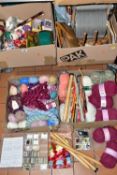 FOUR BOXES OF WOOL CARDING EQUIPMENT, BALLS OF WOOL AND KNITTING NEEDLES, to include a 1970's