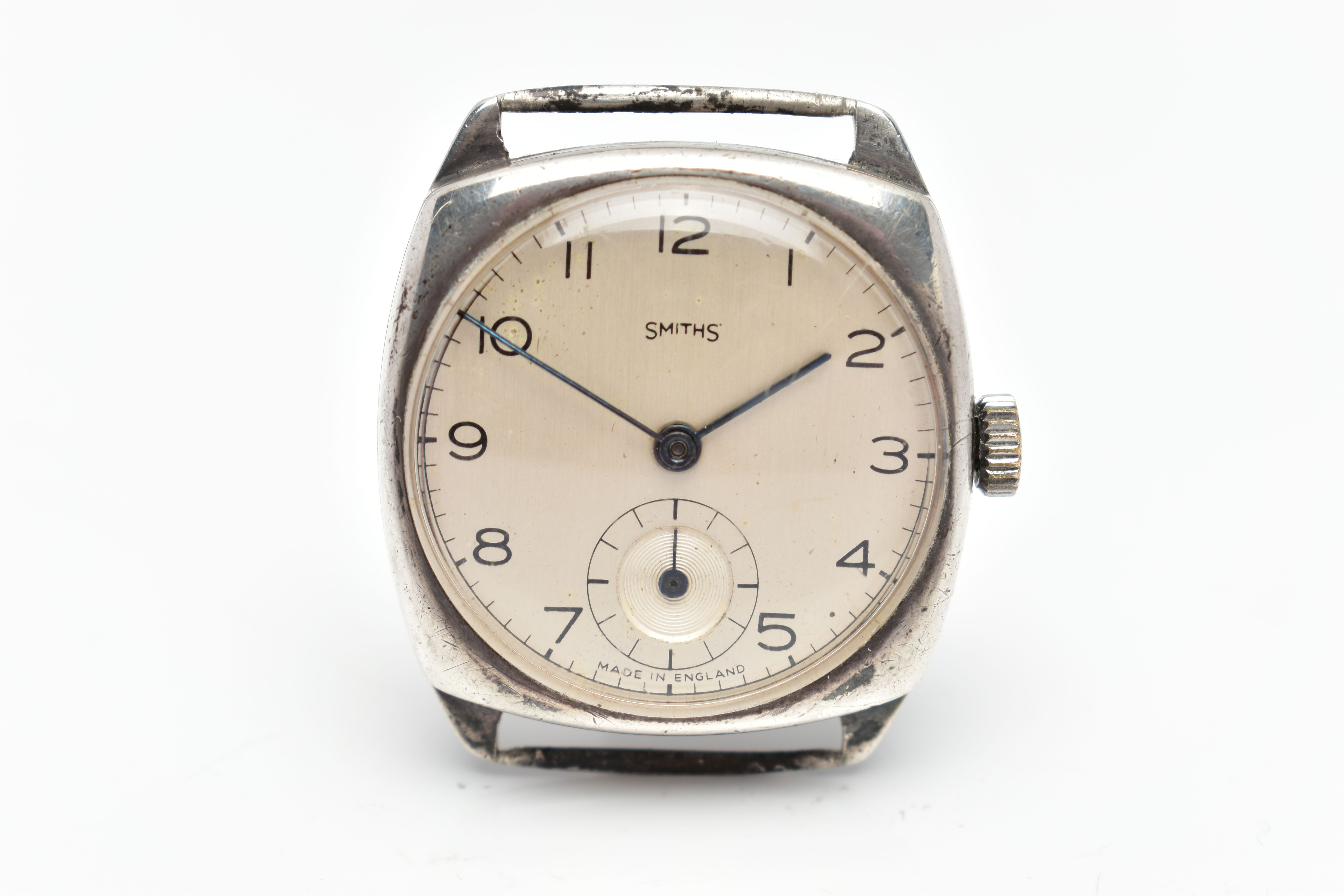 A WHITE METAL SMITHS WATCH HEAD, manual wind, cream colour dial, with Arabic hourly markers,