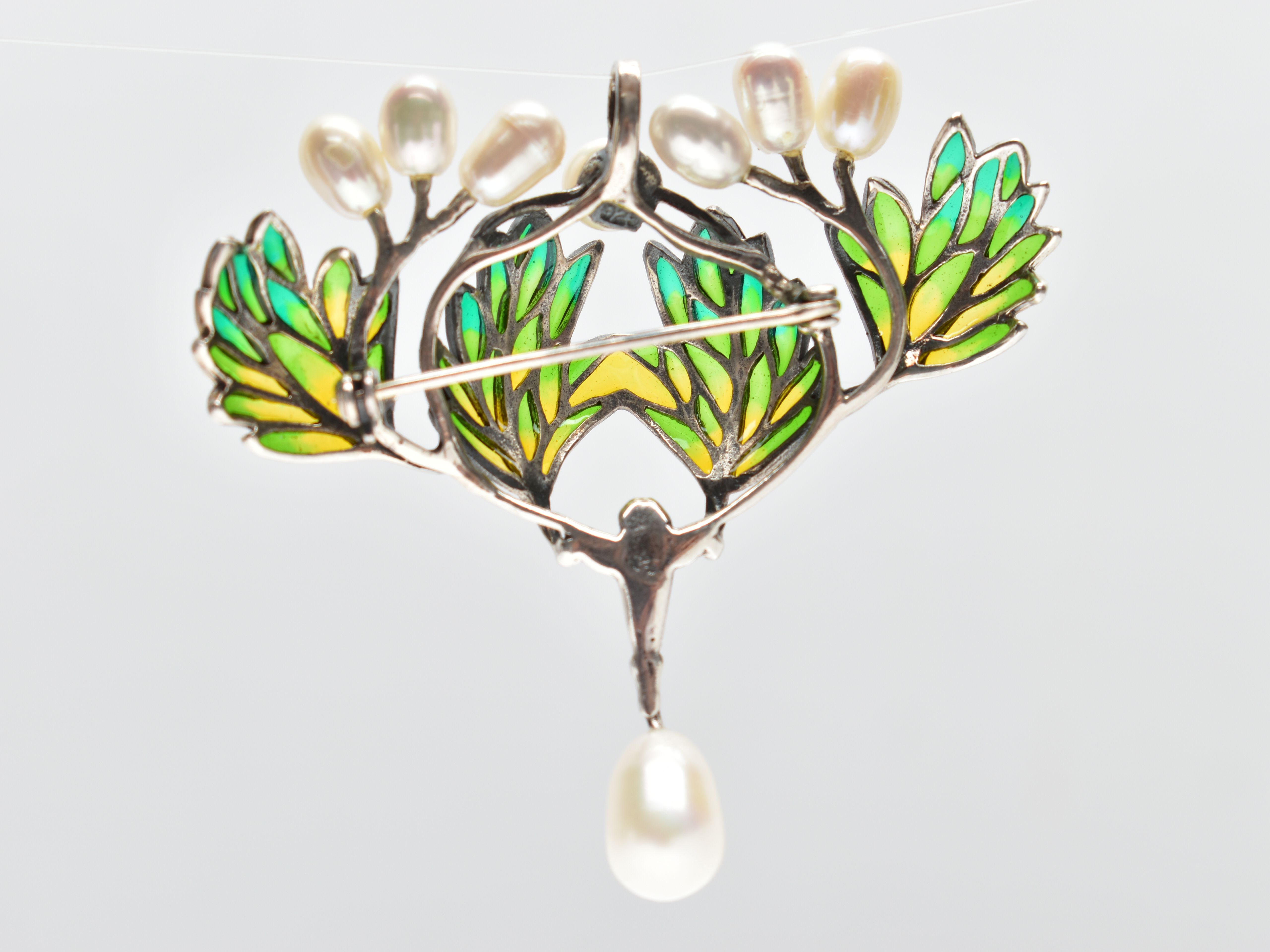 A PLIQUE A JOUR AND CULTURED PEARL BROOCH, designed as a series of green and yellow enamel feathers, - Image 2 of 2