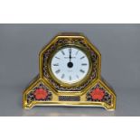 A ROYAL CROWN DERBY OLD IMARI 1128 SOLID GOLD DESK CLOCK, the quartz movement contained in an